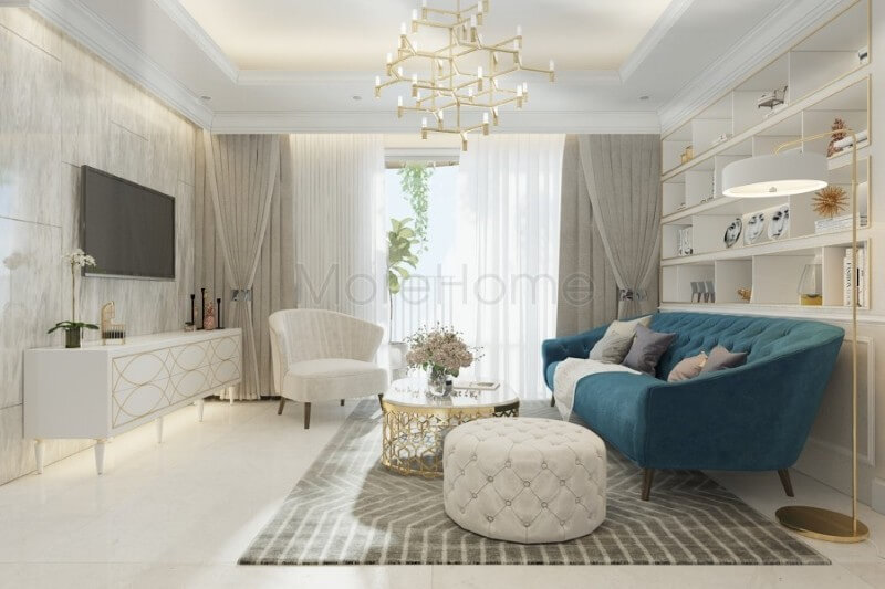 Bộ sofa cao cấp bọc nỉ màu xanh ấn tượng được coi là điểm nhấn sang trọng, tạo sự tươi mới cho không gian phòng khách của gia chủ Sofa tân cổ điển cao cấp