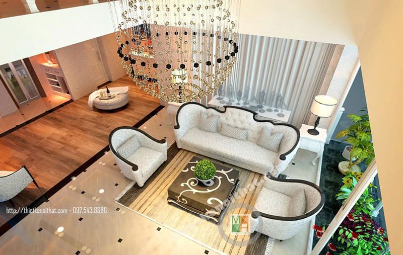 Thiết kế phòng khách sang trọng với nội thất sofa bọc nỉ tân cổ điển với đường cong nhẹ nhàng ở thân ghế tạo điểm nhấn ấn tượng